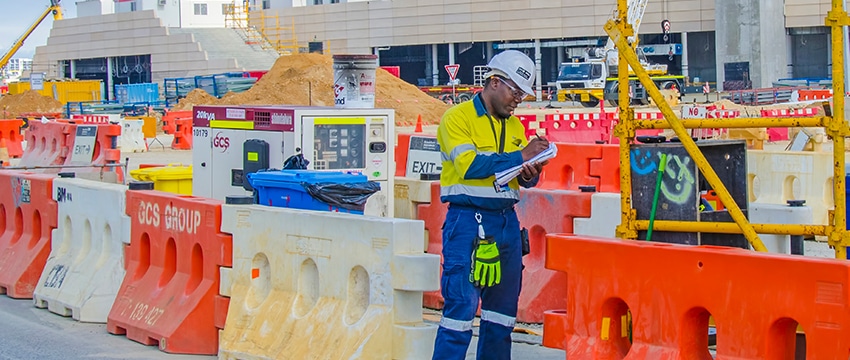 Four Hills services staff working as a security officer doing checks